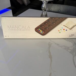 Mancala game for 2. Nib nice gift